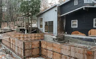 Prepared site with foundation forms for home remodeling and addition project in Long Beach, CA